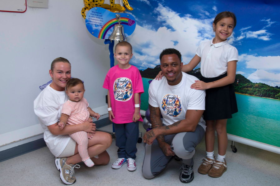 Storm with his family as he rang the end of treatment bell 