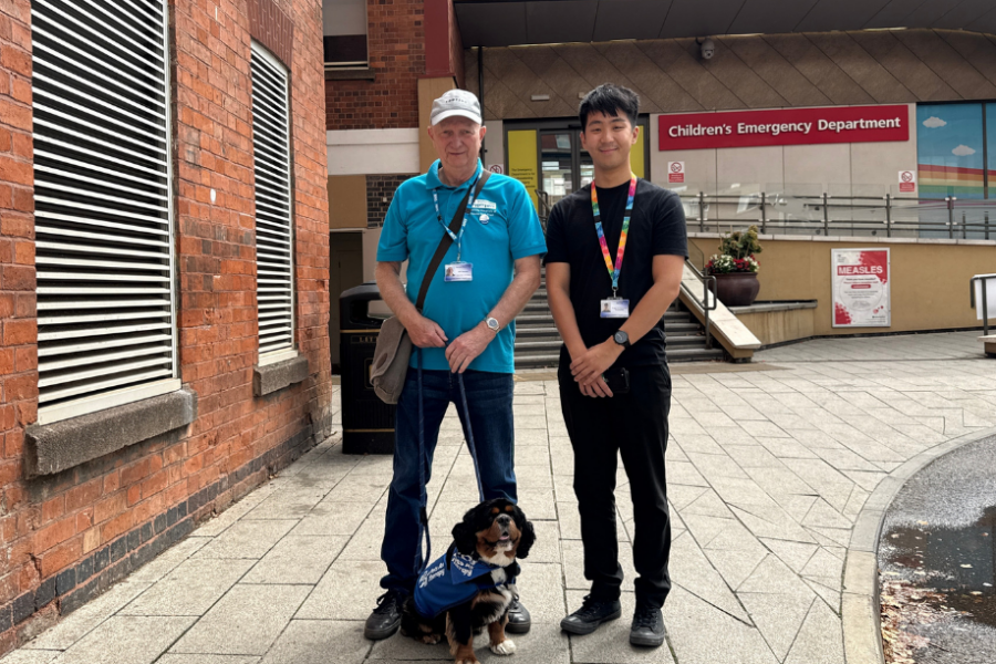 Ken, Volunteer, Ben, the therapy dog, and Jian, Volunteers Coordinator at UHL